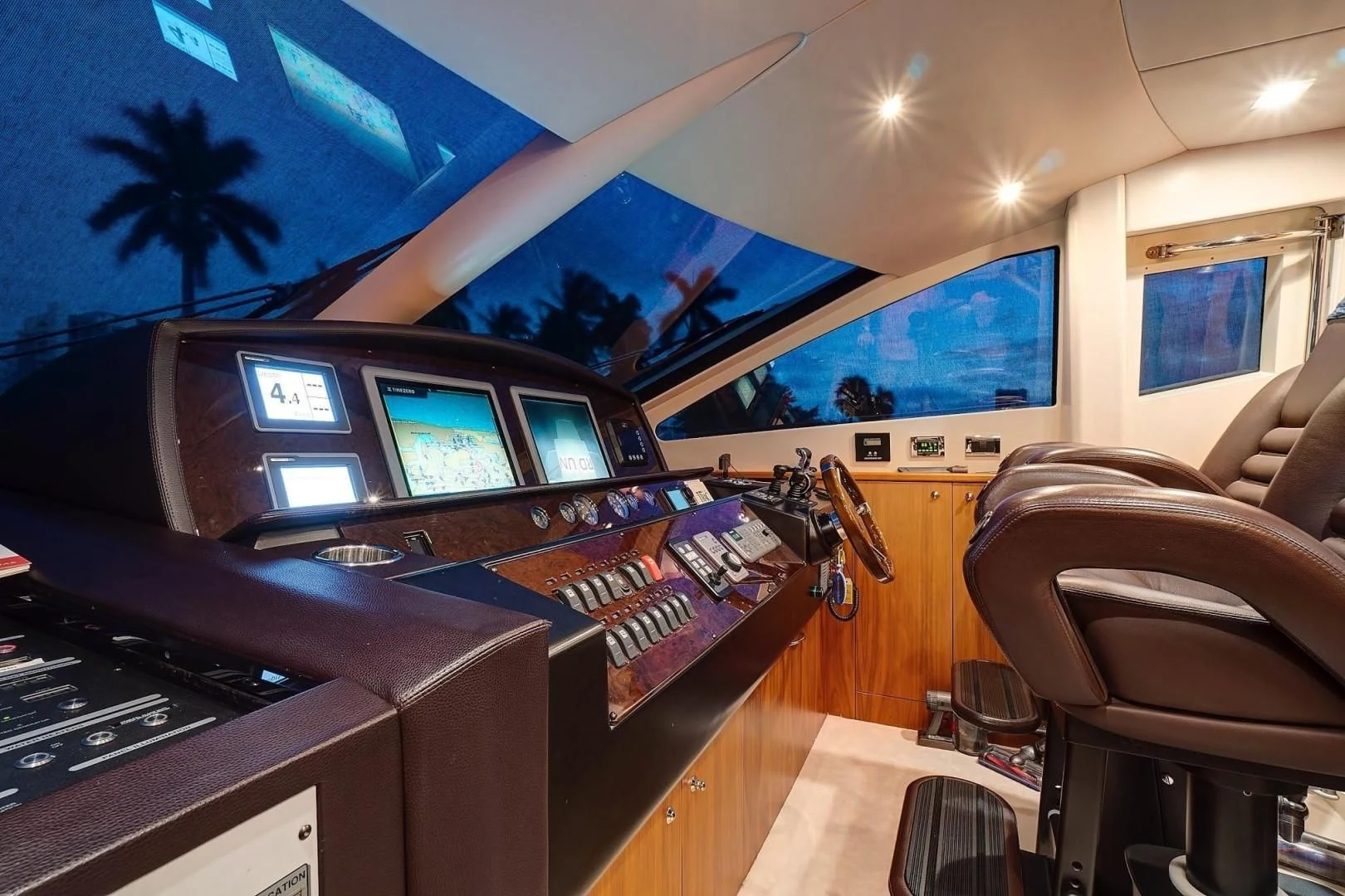 a room with computers and a television aboard SPLASHED OUT Yacht for Sale