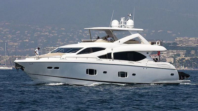 a white yacht in the water aboard SPLASHED OUT Yacht for Sale