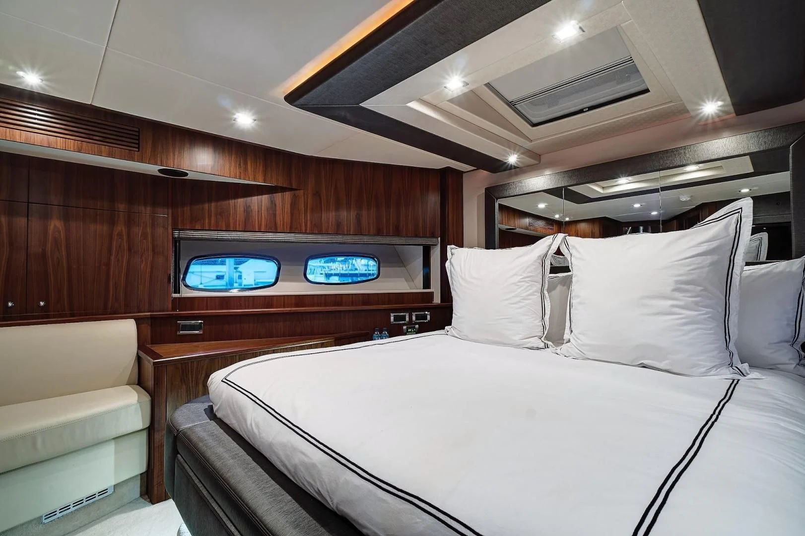 a bed with a television on it aboard SPLASHED OUT Yacht for Sale