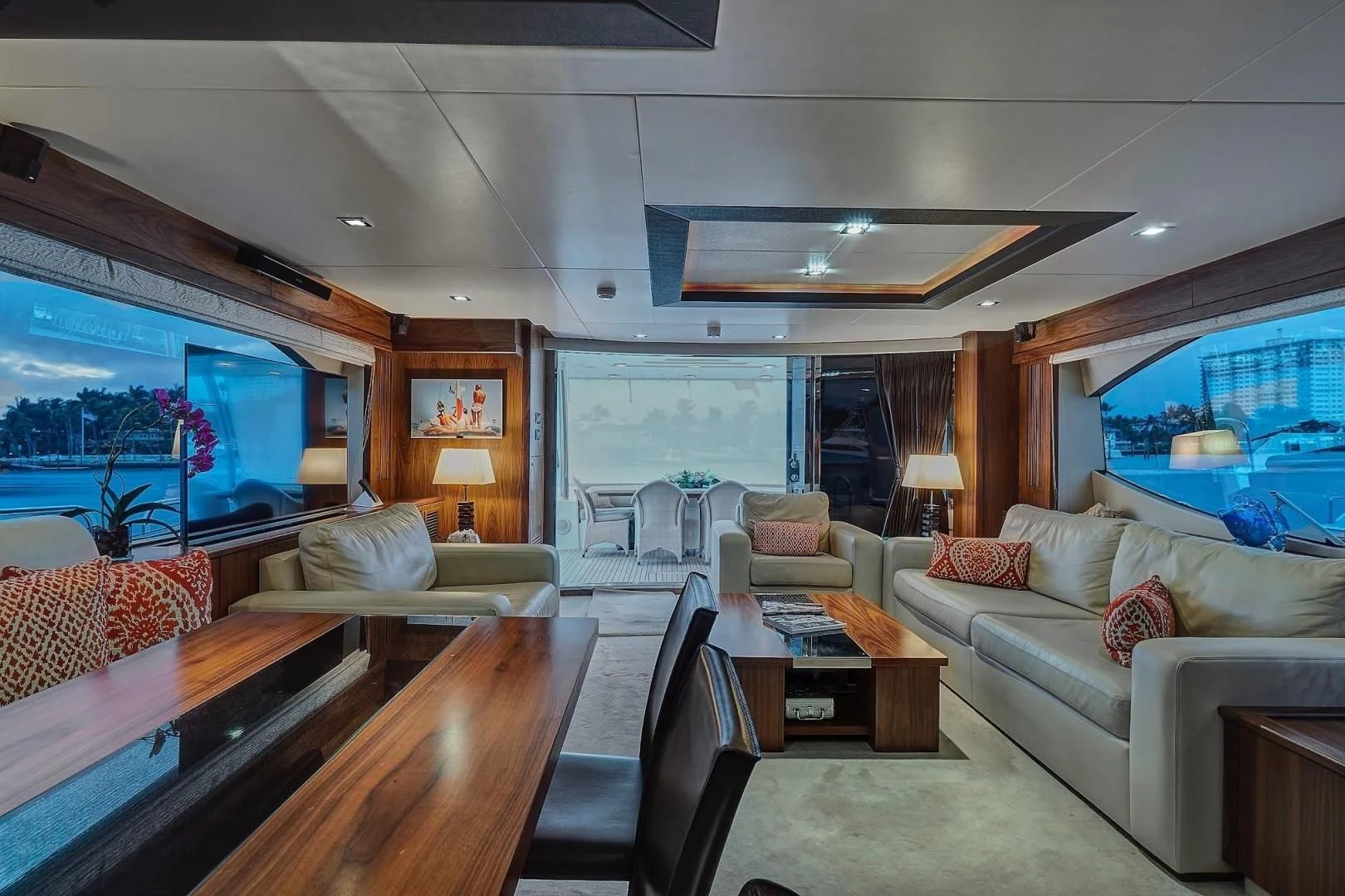 a living room with a large window aboard SPLASHED OUT Yacht for Sale