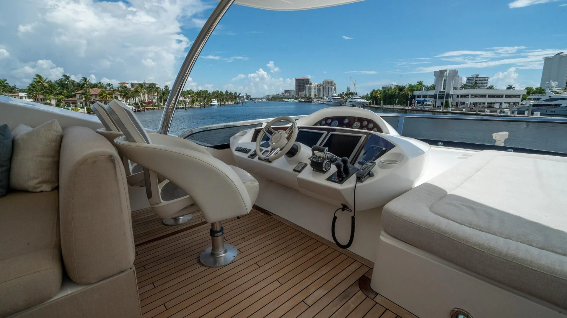 a white yacht on a deck aboard SPLASHED OUT Yacht for Sale