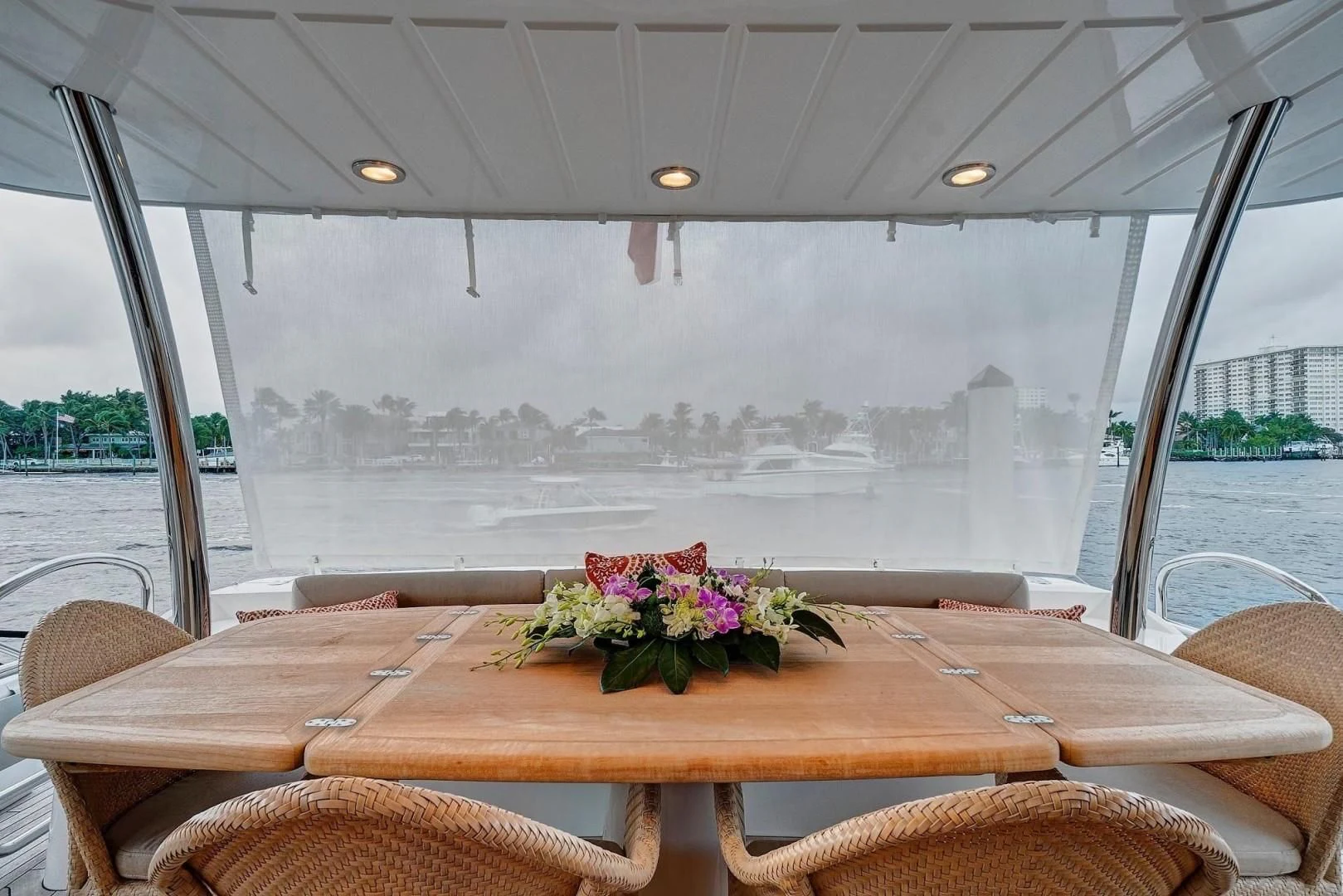 a table with flowers on it aboard SPLASHED OUT Yacht for Sale