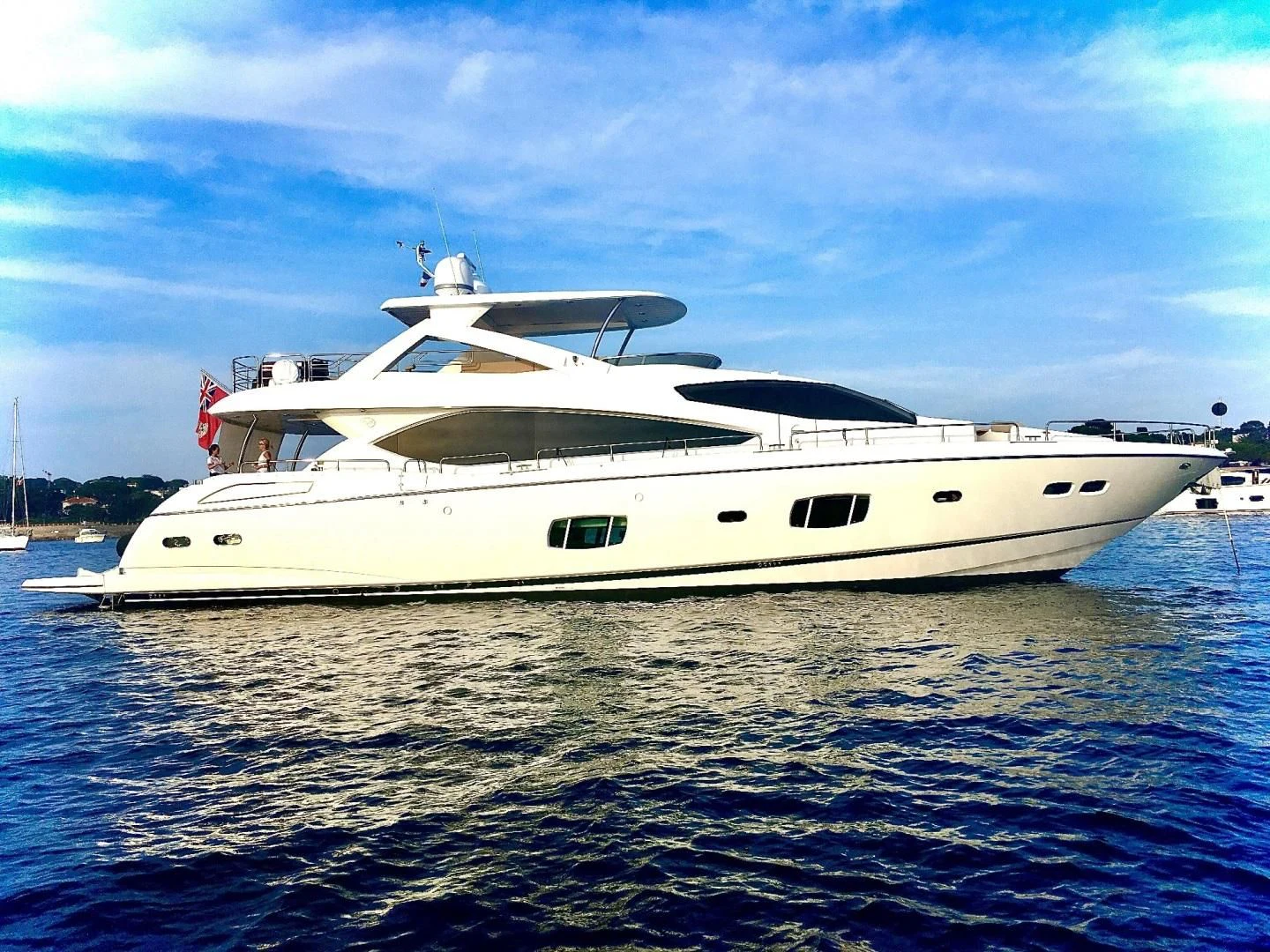 a white yacht in the water aboard SPLASHED OUT Yacht for Sale