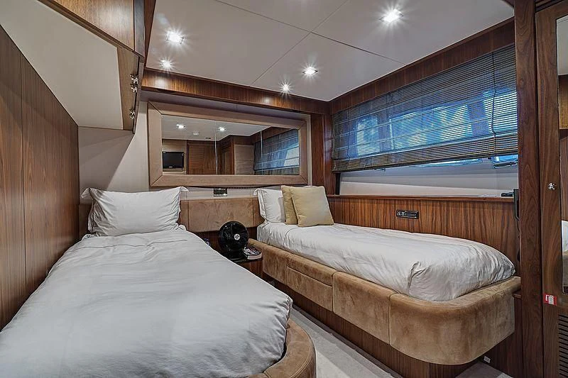 a couple of beds in a room aboard SPLASHED OUT Yacht for Sale