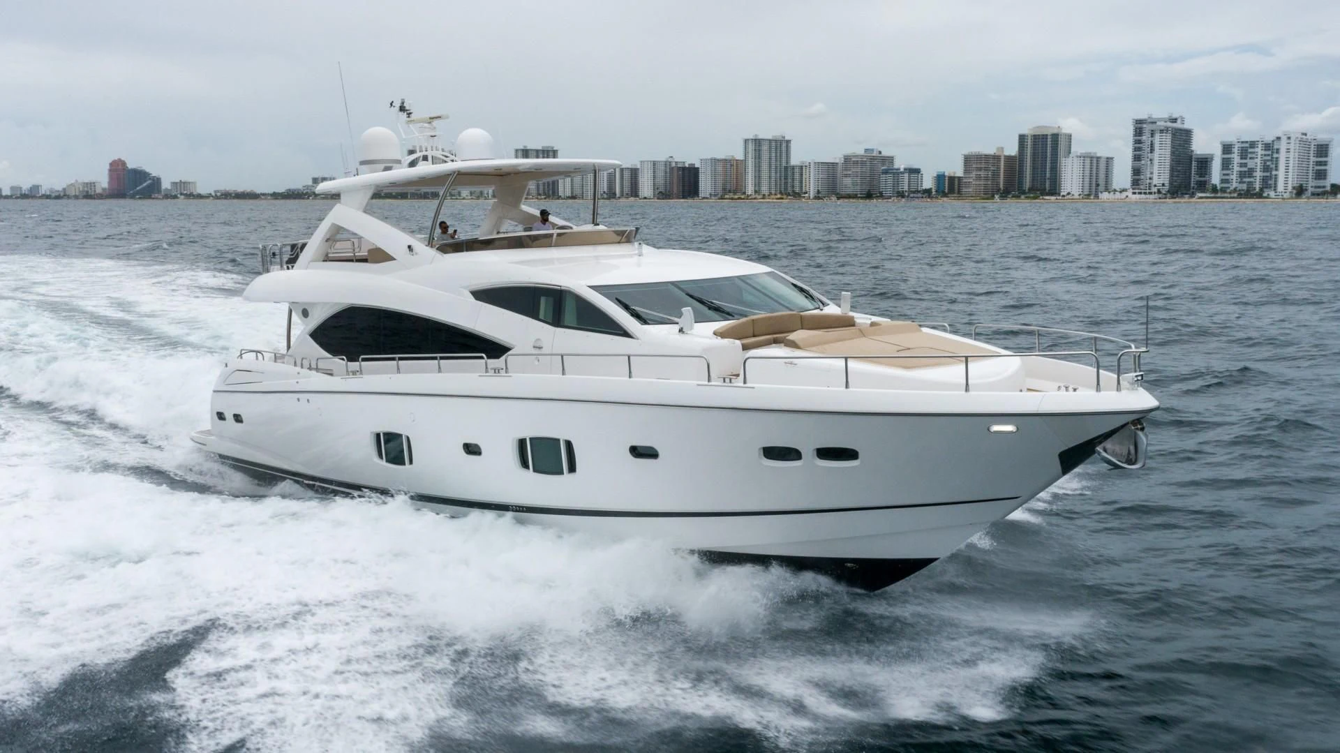 a white yacht on the water aboard SPLASHED OUT Yacht for Sale