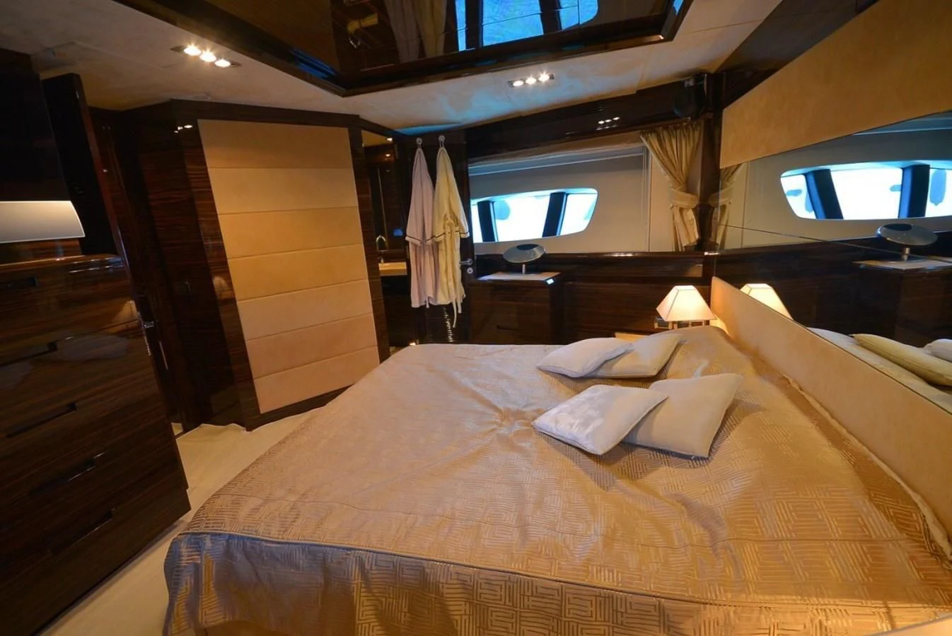 a room with a bed and a television aboard JULIA DOROTHY Yacht for Sale