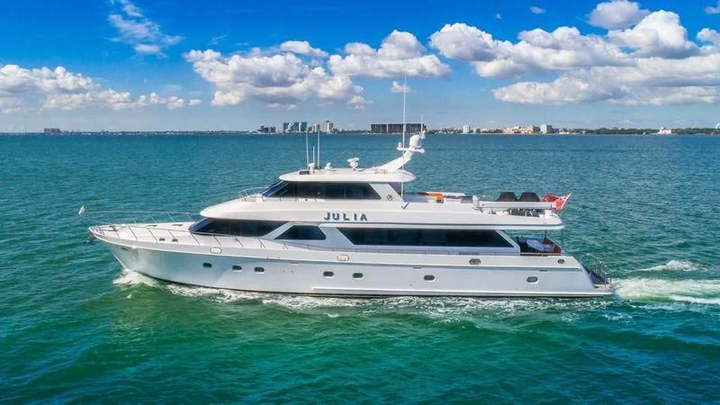 a white yacht in the water aboard JULIA DOROTHY Yacht for Sale