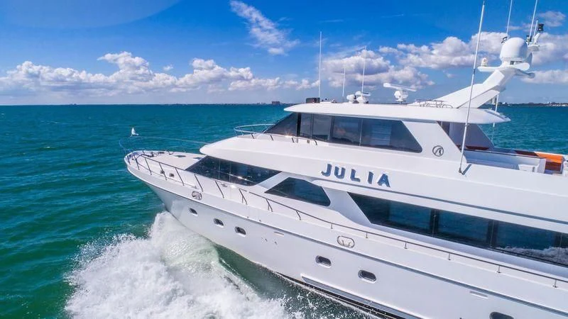 a white yacht in the water aboard JULIA DOROTHY Yacht for Sale