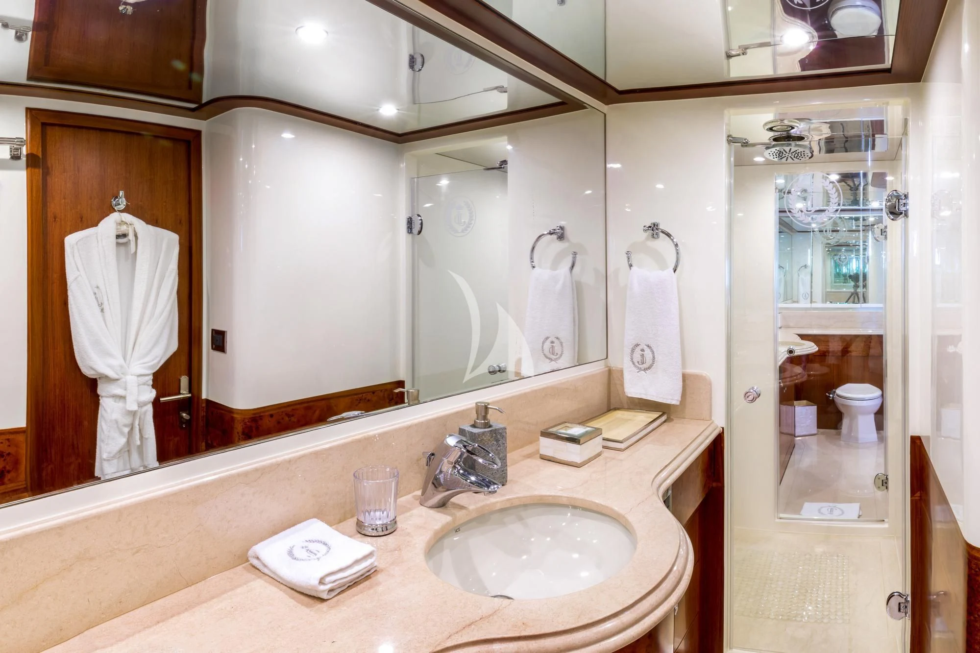 a bathroom with a large mirror aboard JULIA DOROTHY Yacht for Sale