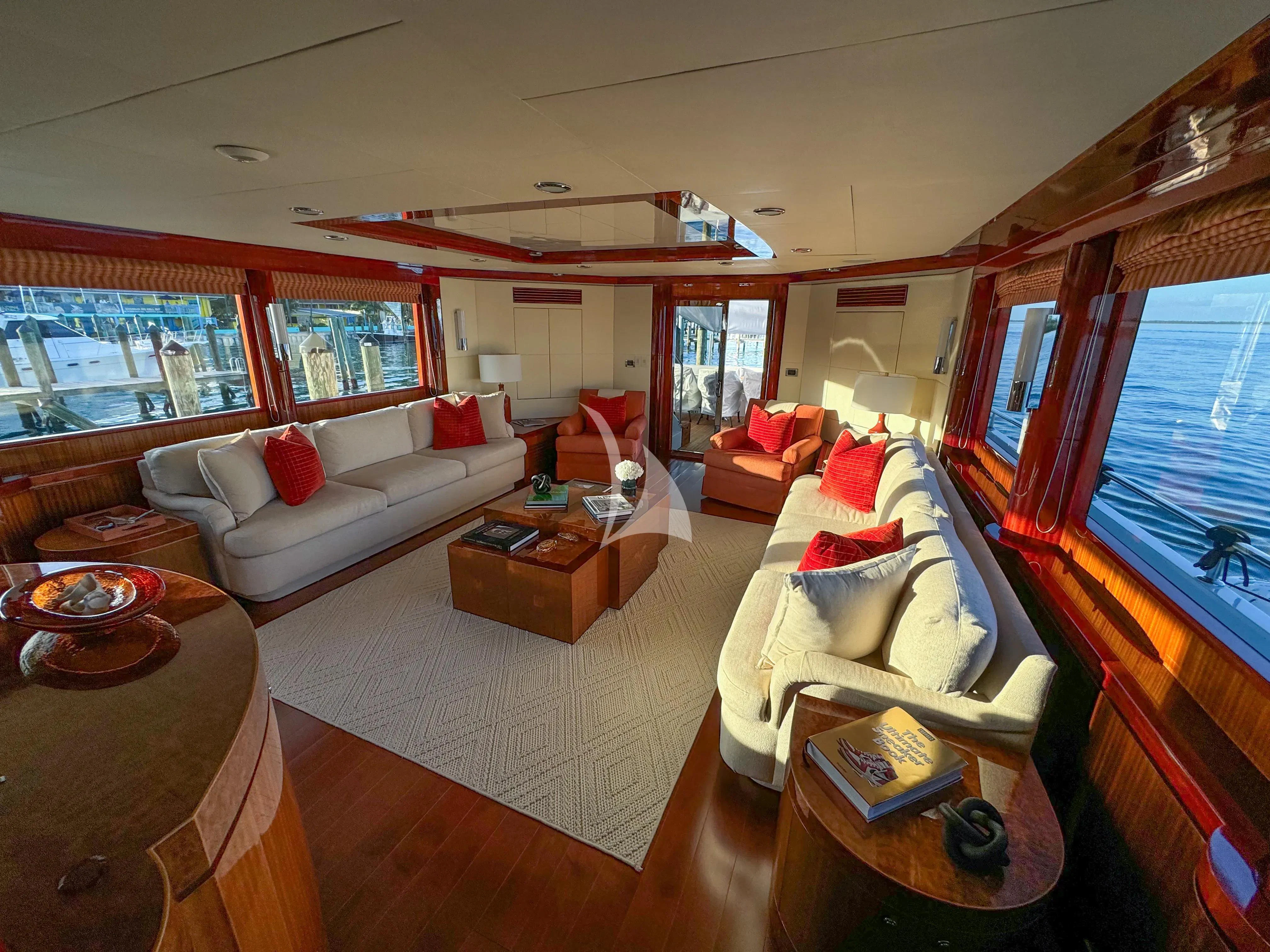 a living room with a large window aboard JULIA DOROTHY Yacht for Sale
