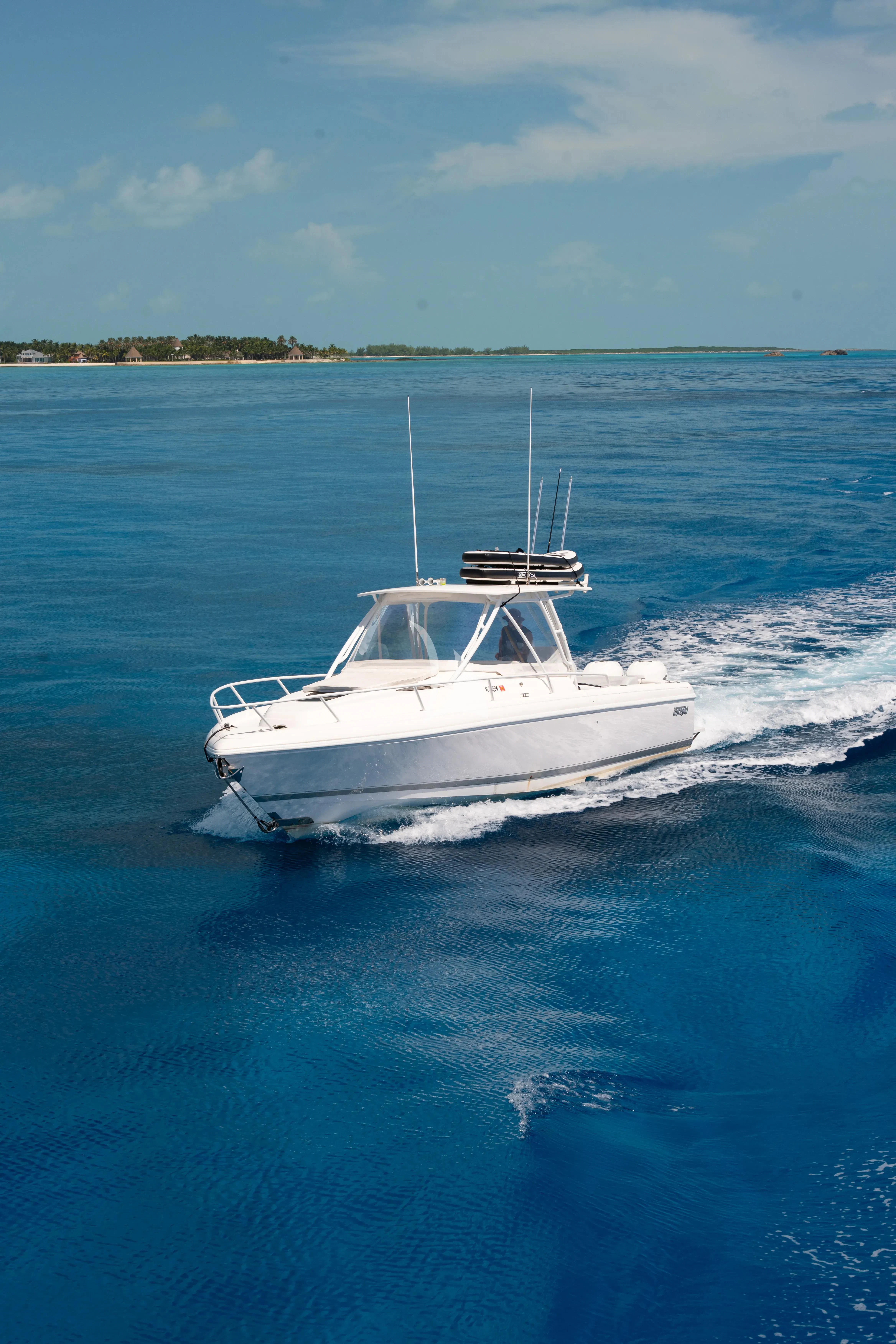 a white boat in the water aboard JULIA DOROTHY Yacht for Sale