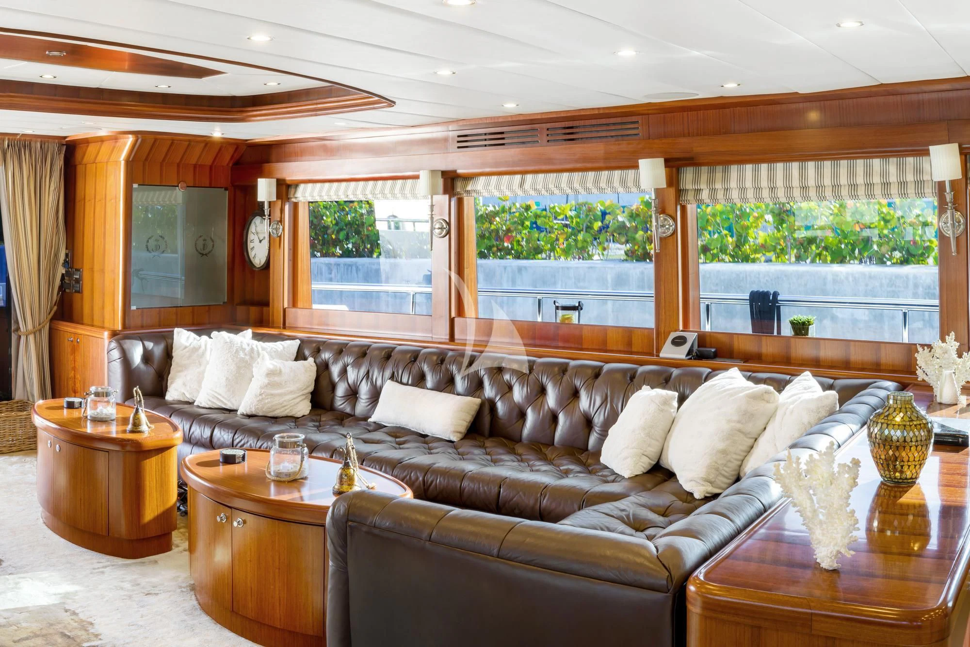 a living room with a leather couch aboard JULIA DOROTHY Yacht for Sale