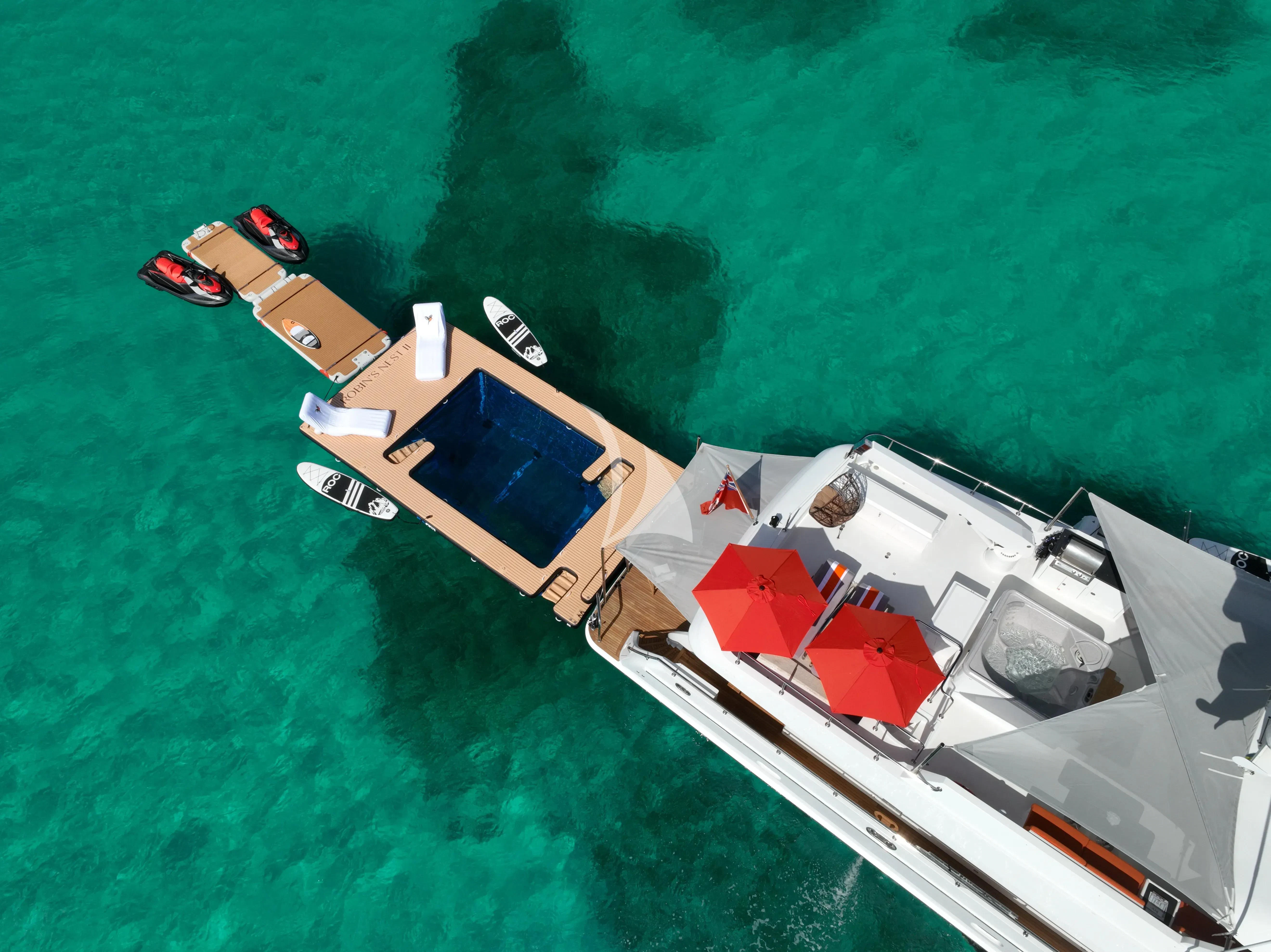 a group of boats on a body of water aboard JULIA DOROTHY Yacht for Sale