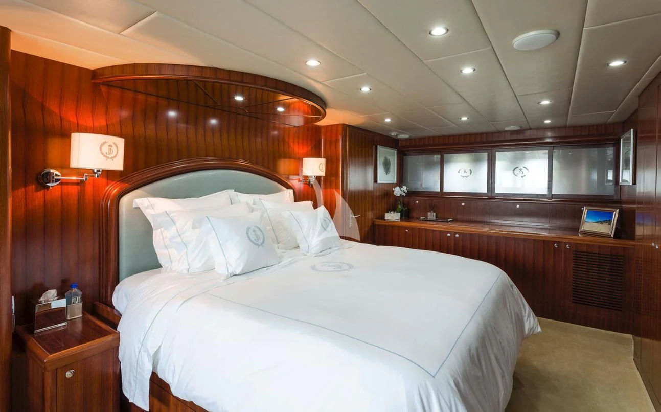 a large bed in a hotel room aboard JULIA DOROTHY Yacht for Sale
