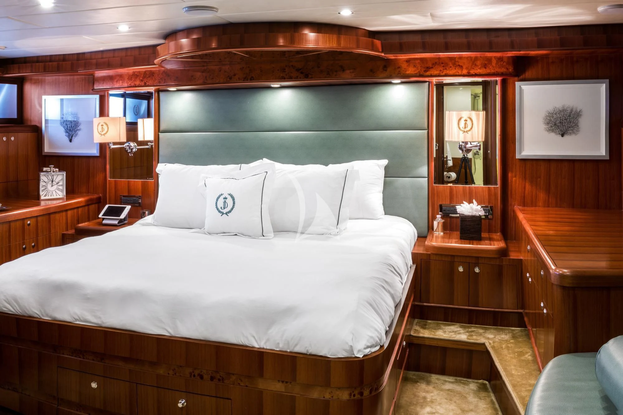 a bed with white sheets aboard JULIA DOROTHY Yacht for Sale