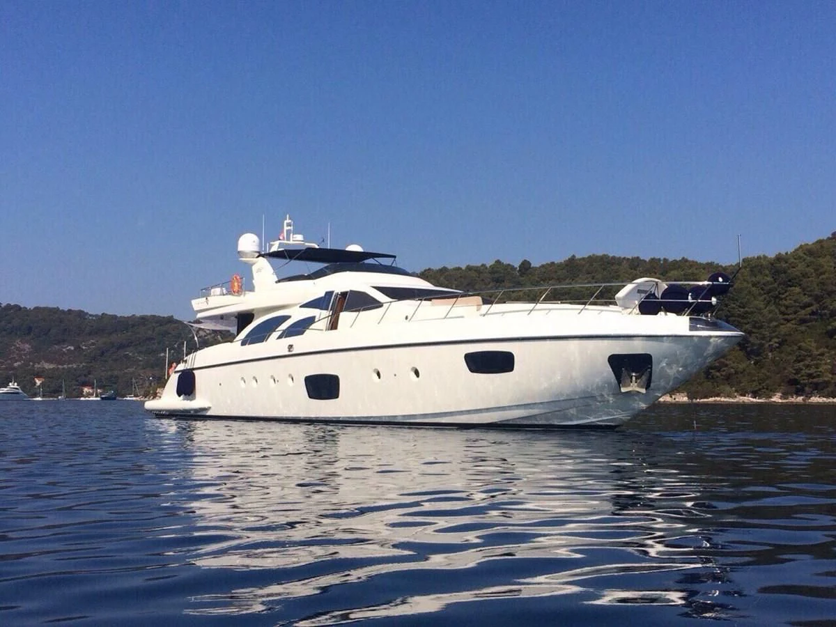 a white yacht on the water aboard JULIA DOROTHY Yacht for Sale