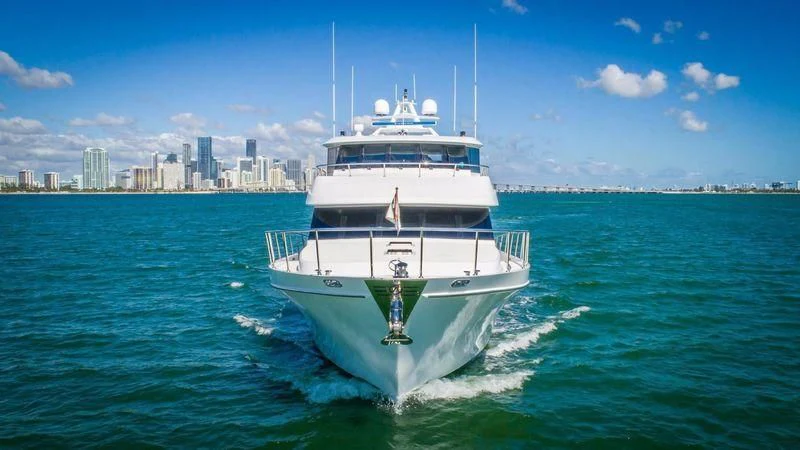 a white boat on the water aboard JULIA DOROTHY Yacht for Sale