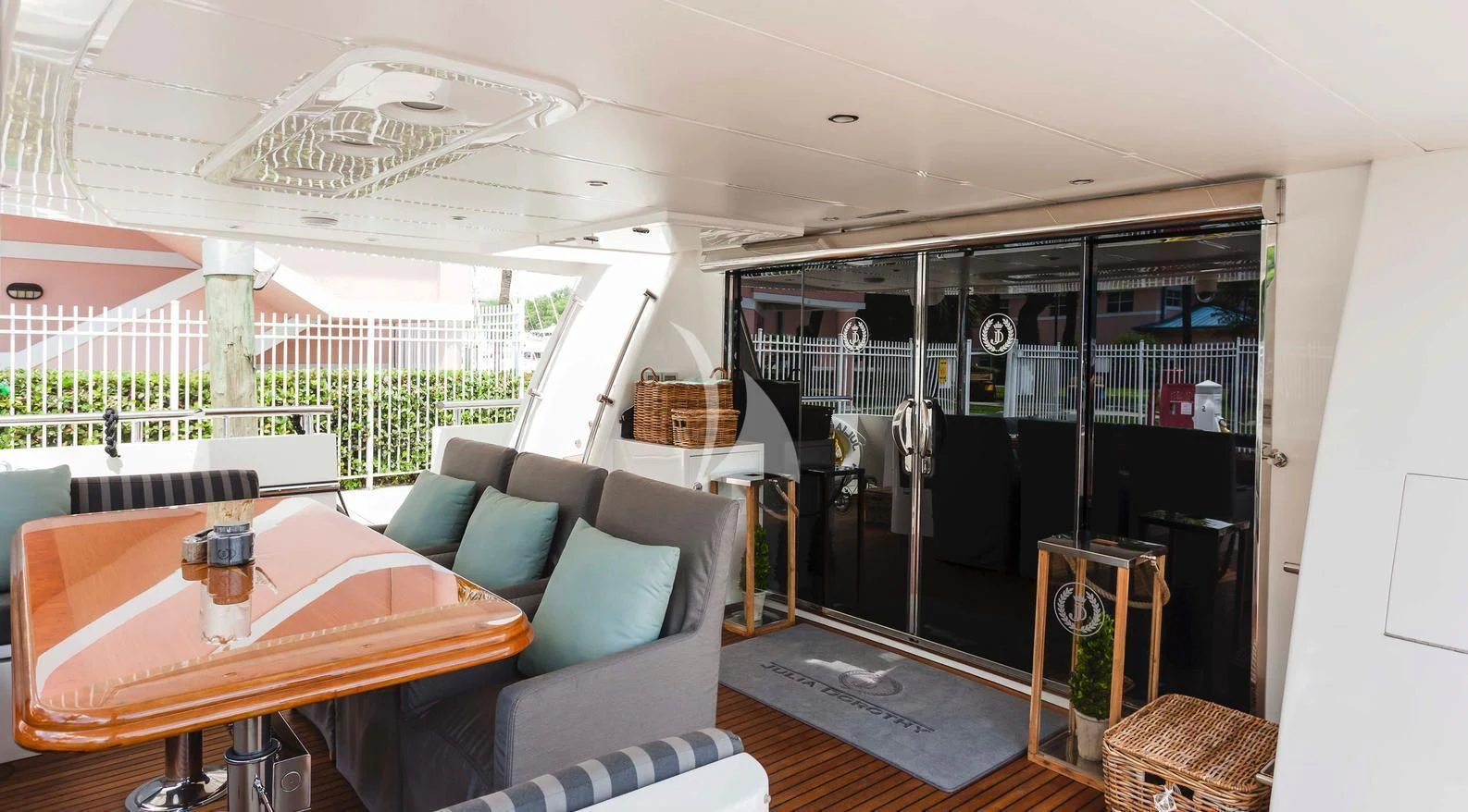 a living room with a table and chairs aboard JULIA DOROTHY Yacht for Sale