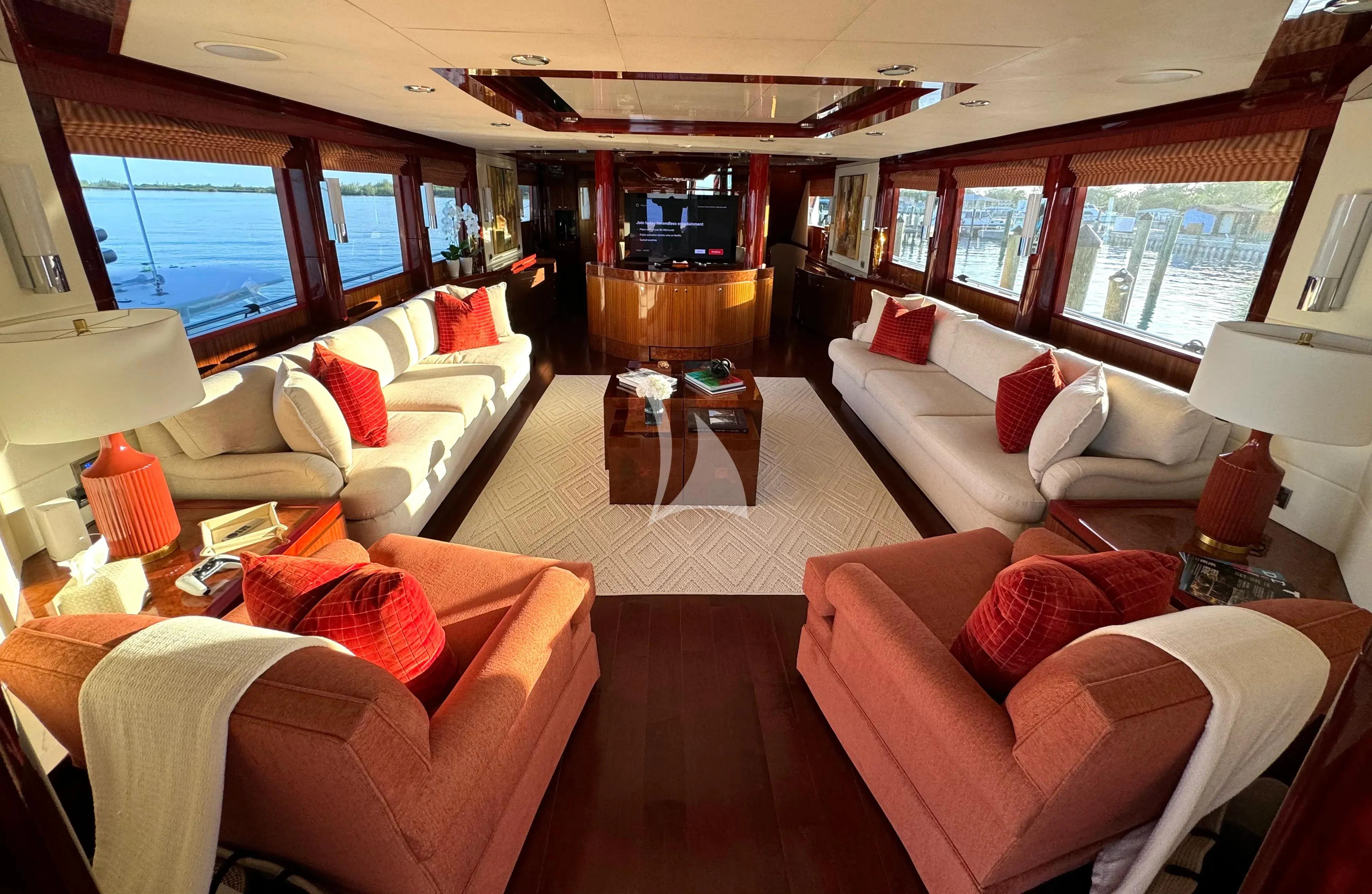 a living room with a large window aboard JULIA DOROTHY Yacht for Sale
