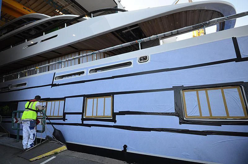 a person working on a large metal structure aboard 818 Yacht for Sale