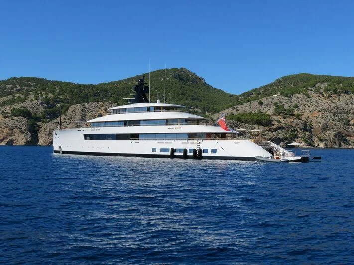a white yacht in the water aboard 818 Yacht for Sale