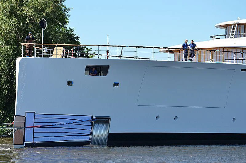 a large white boat aboard 818 Yacht for Sale