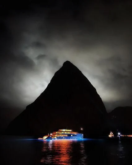 a large rock with a body of water in the background aboard 818 Yacht for Sale