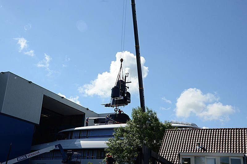 a crane in the air aboard 818 Yacht for Sale