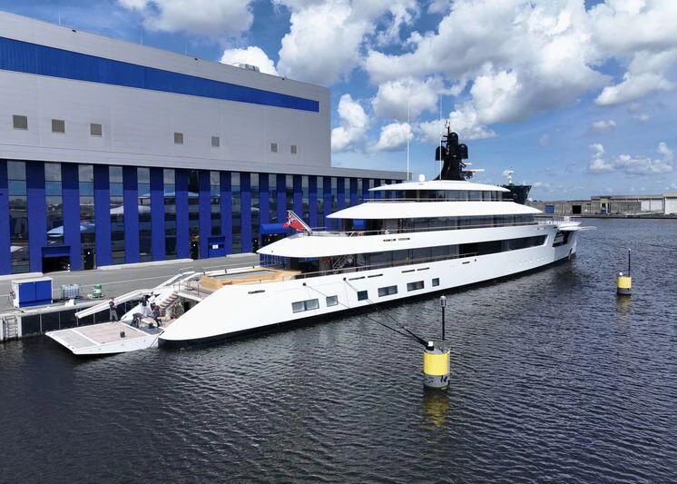 a large white ship docked aboard 818 Yacht for Sale