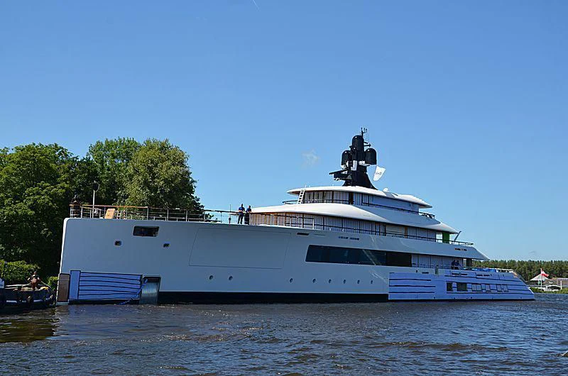 a large white boat on the water aboard 818 Yacht for Sale