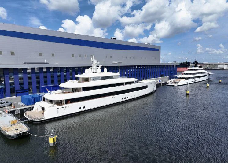 a large cruise ship docked aboard 818 Yacht for Sale