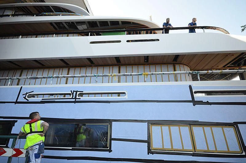 a person walking on a train aboard 818 Yacht for Sale