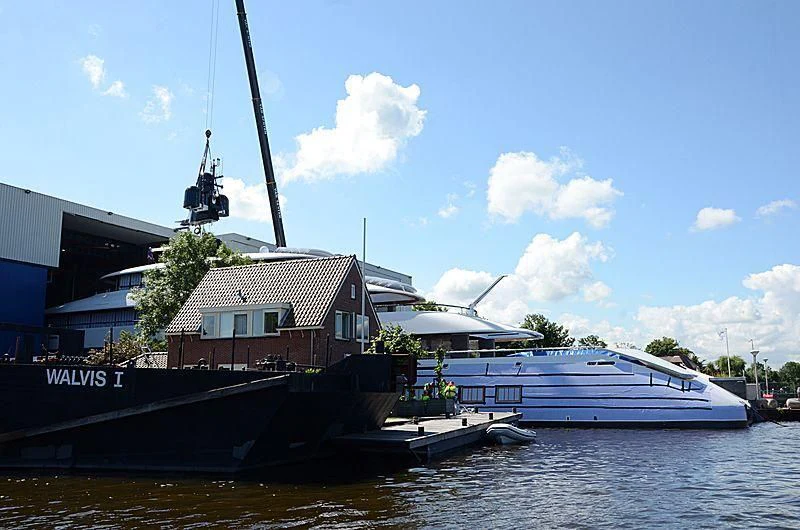 a boat docked at a pier aboard 818 Yacht for Sale