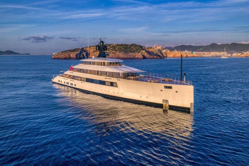 a large white ship in the water aboard 818 Yacht for Sale