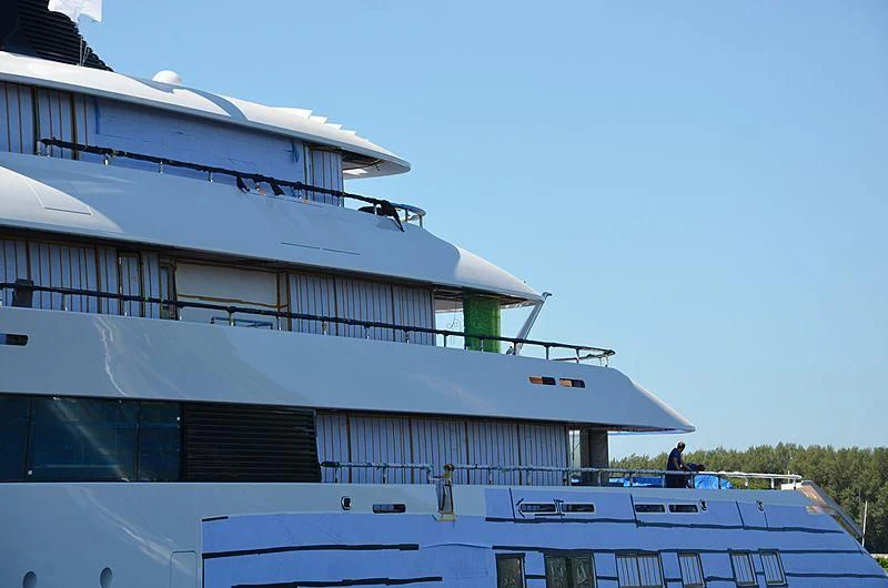 a person standing on a boat aboard 818 Yacht for Sale