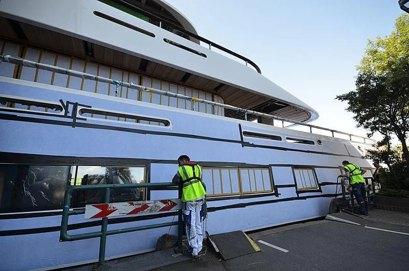 a group of men working on a train aboard 818 Yacht for Sale
