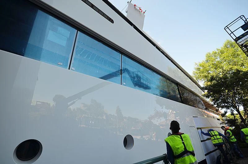 a large glass building aboard 818 Yacht for Sale