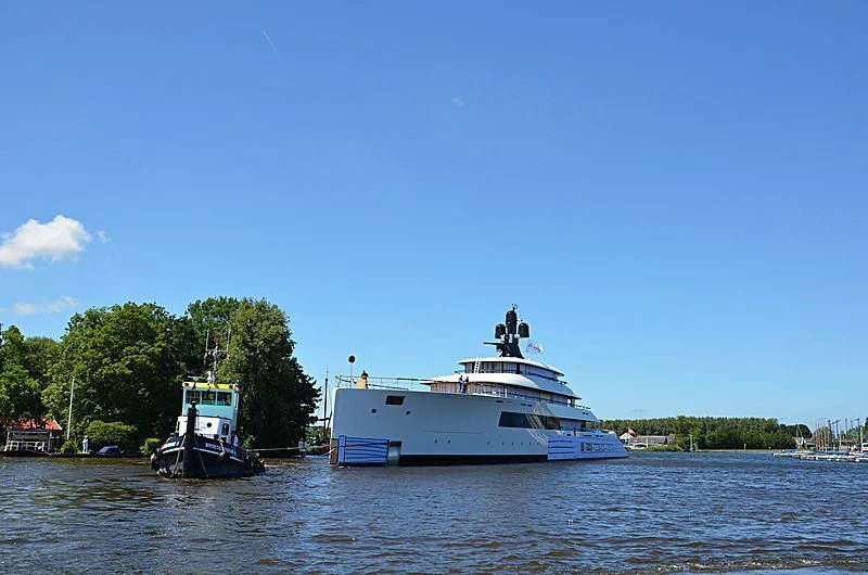 a couple of boats on the water aboard 818 Yacht for Sale