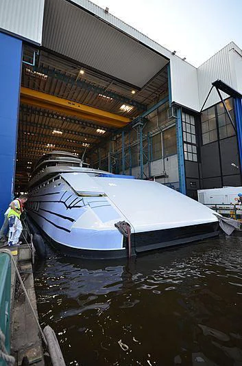a boat docked at a pier aboard 818 Yacht for Sale