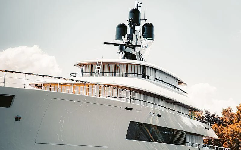 a large white cruise ship aboard 818 Yacht for Sale