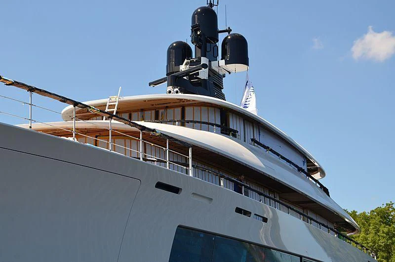 a large white boat with a large propeller on it aboard 818 Yacht for Sale