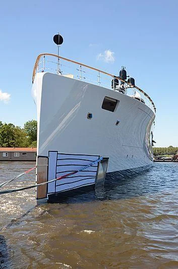 a large white boat in the water aboard 818 Yacht for Sale