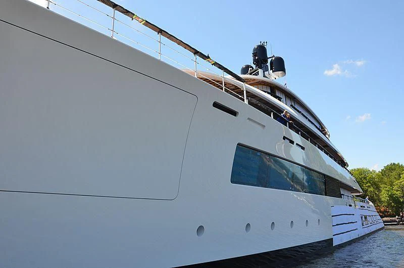 a boat with a person on the deck aboard 818 Yacht for Sale
