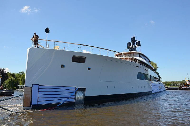 a large white boat aboard 818 Yacht for Sale