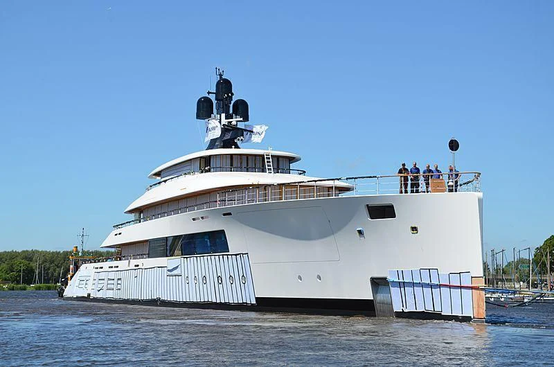a large white boat on the water aboard 818 Yacht for Sale
