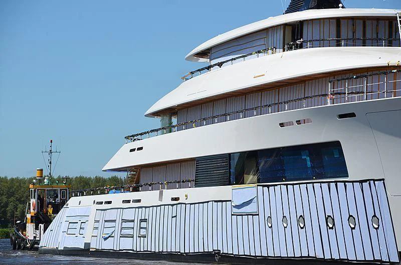 a large white boat aboard 818 Yacht for Sale