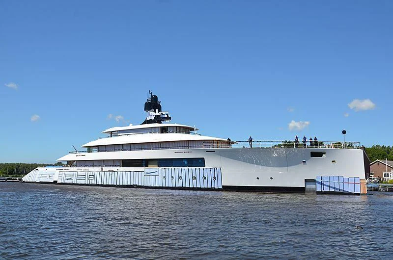 a large white boat on the water aboard 818 Yacht for Sale