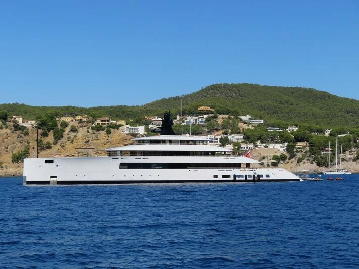 a large white ship in the water aboard 818 Yacht for Sale