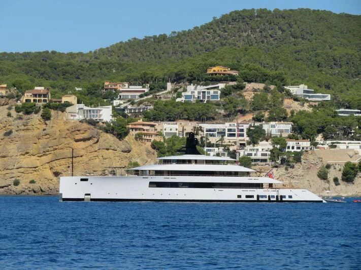 a large white boat in the water aboard 818 Yacht for Sale
