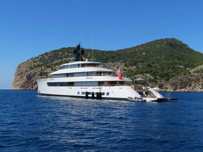 a white yacht in the water aboard 818 Yacht for Sale